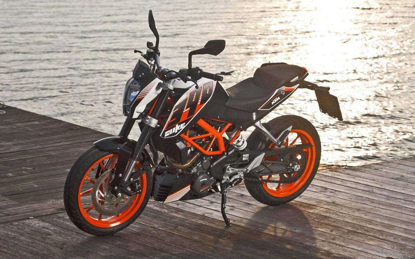 Ktm Duke 390 On Wooden Dock Wallpaper