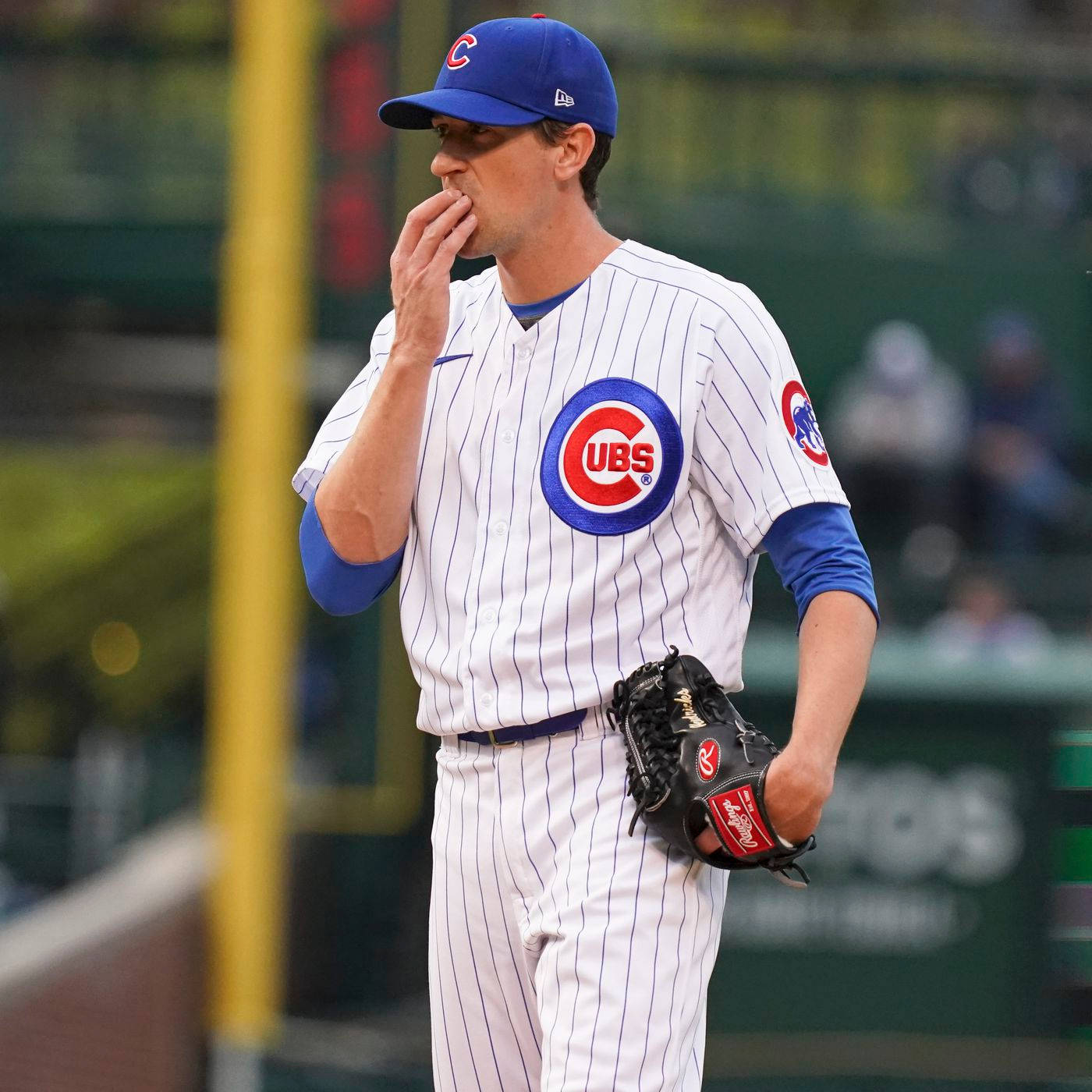 Kyle Hendricks Kissing His Hand Wallpaper