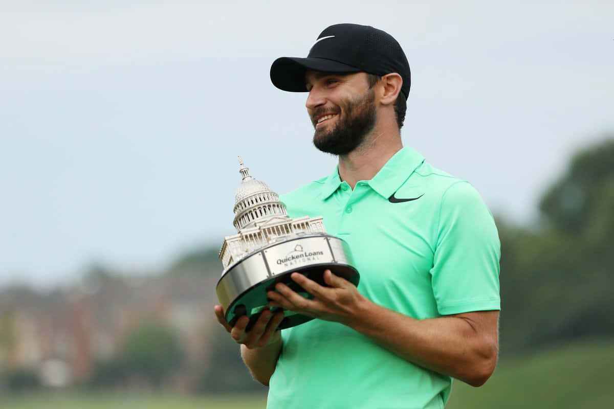 Kyle Stanley Holding A Trophy Wallpaper