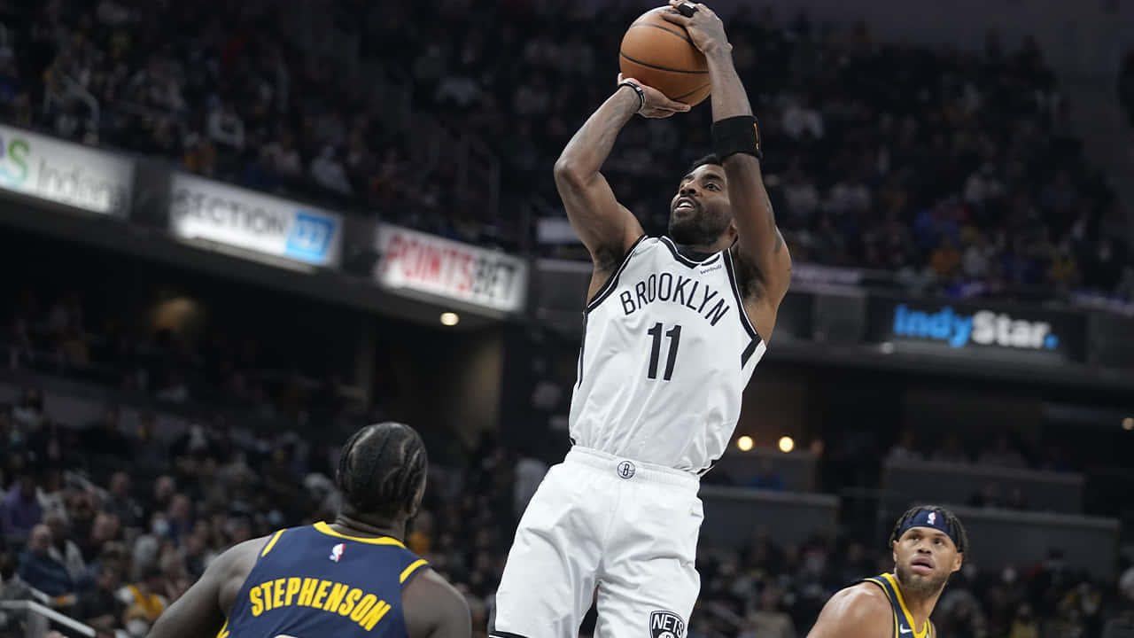 Kyrie Irving In His Nets Jersey, Ready To Make The Team A Playoff Contender Wallpaper