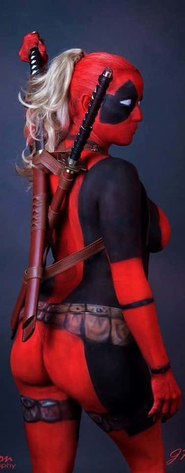 Lady Deadpool Zipping Up Ready For Action Wallpaper