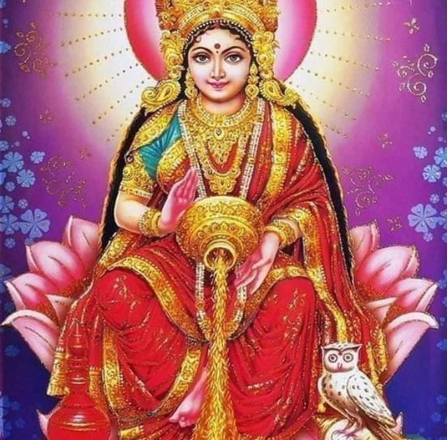 Lakshmi Devi Pouring Out Coins Wallpaper