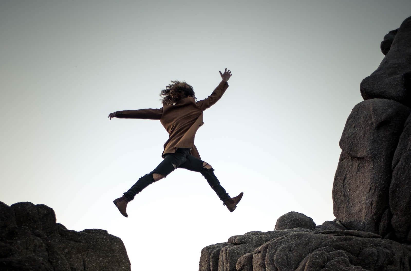 Languishing Woman On The Cliff Wallpaper