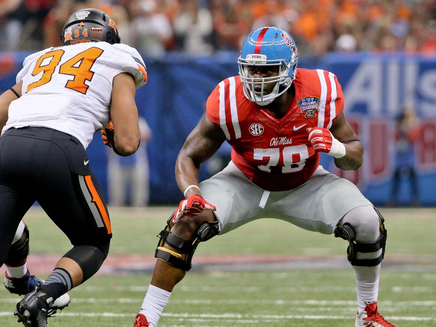 Laremy Tunsil Defense Bending Stance Wallpaper