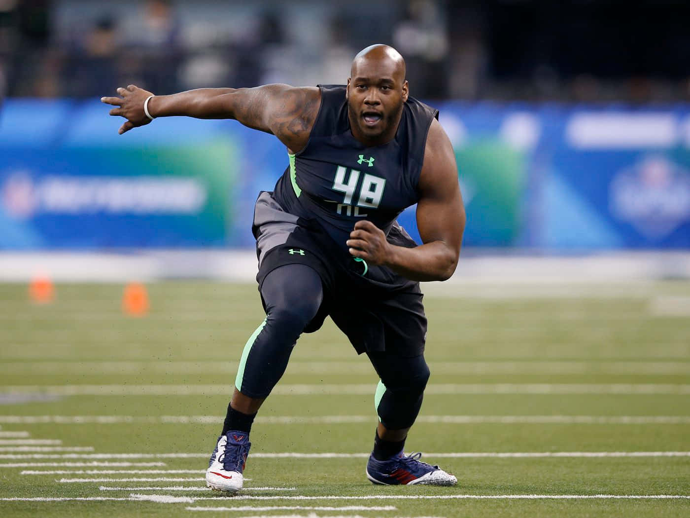 Laremy Tunsil Training On Football Field Wallpaper