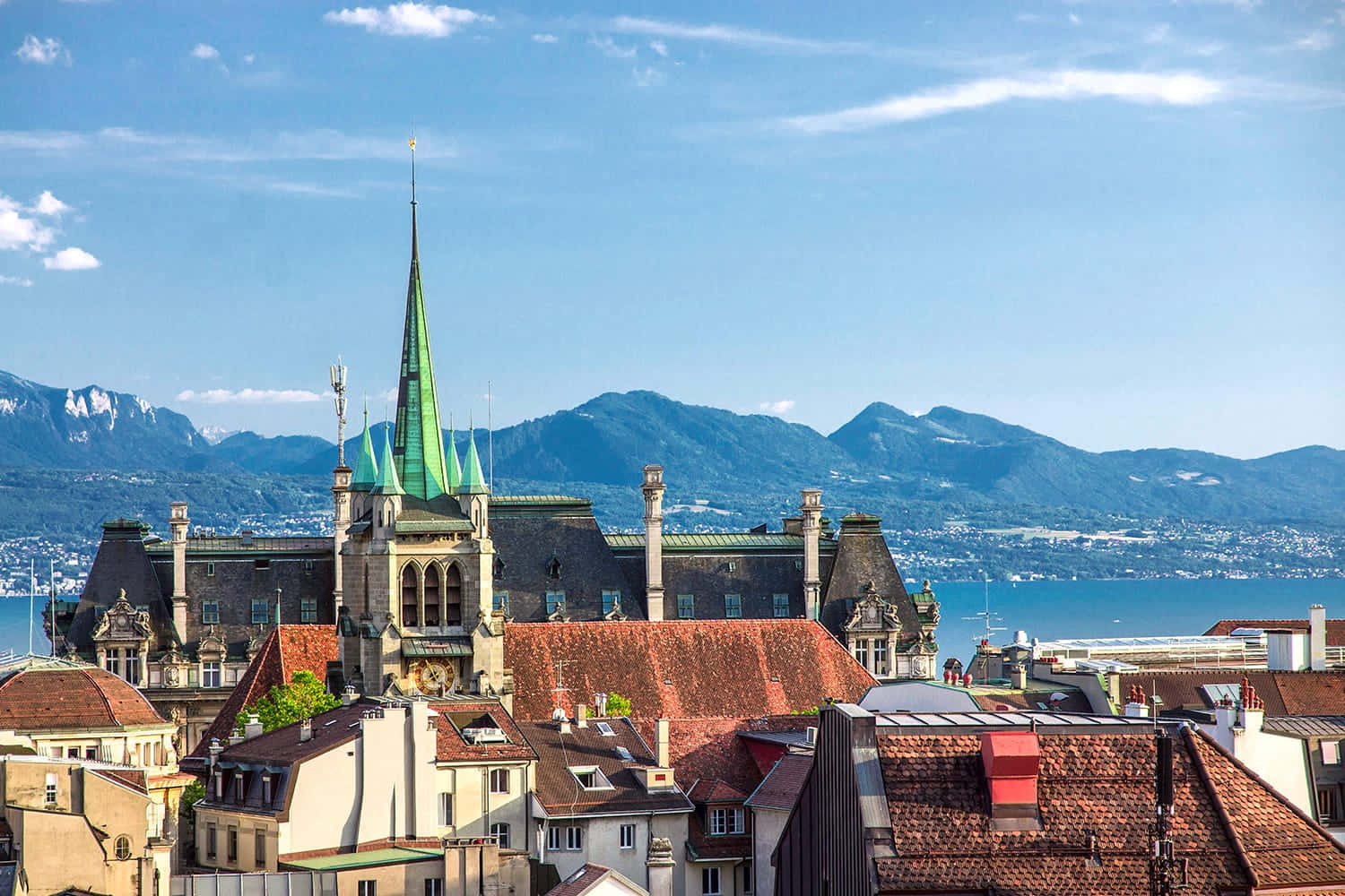 Lausanne Cityscapewith Lake Geneva Wallpaper