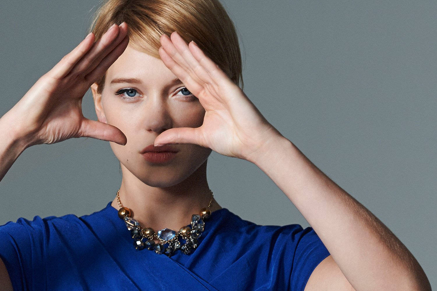 Lea Seydoux Hand Pose Wallpaper