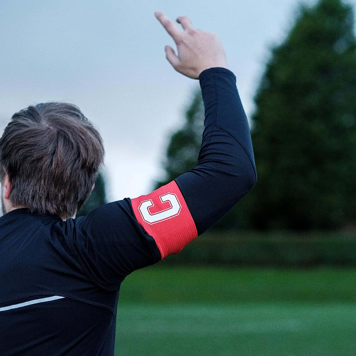 Leader On-field - Captain Wearing A Football Armband Wallpaper