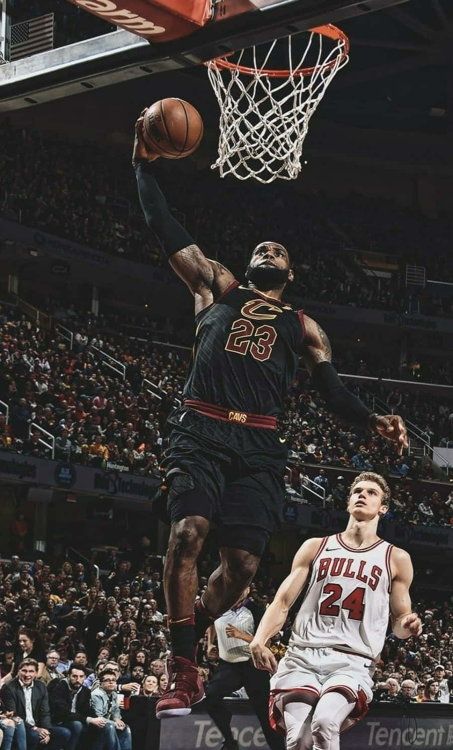 Lebron James Showcasing Skill On Iphone Wallpaper Wallpaper