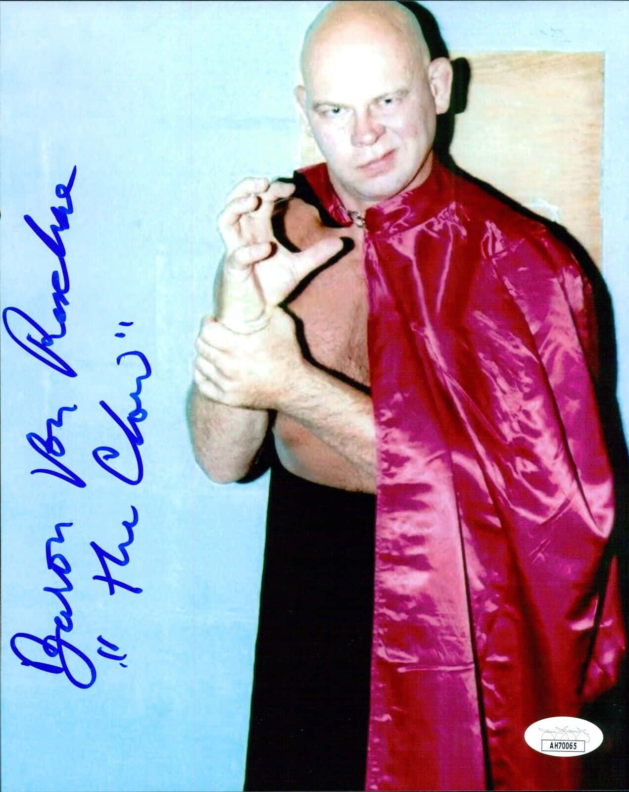 Legendary American Wrestler Baron Von Raschke Showcasing His Famous 'the Claw' Move Wallpaper