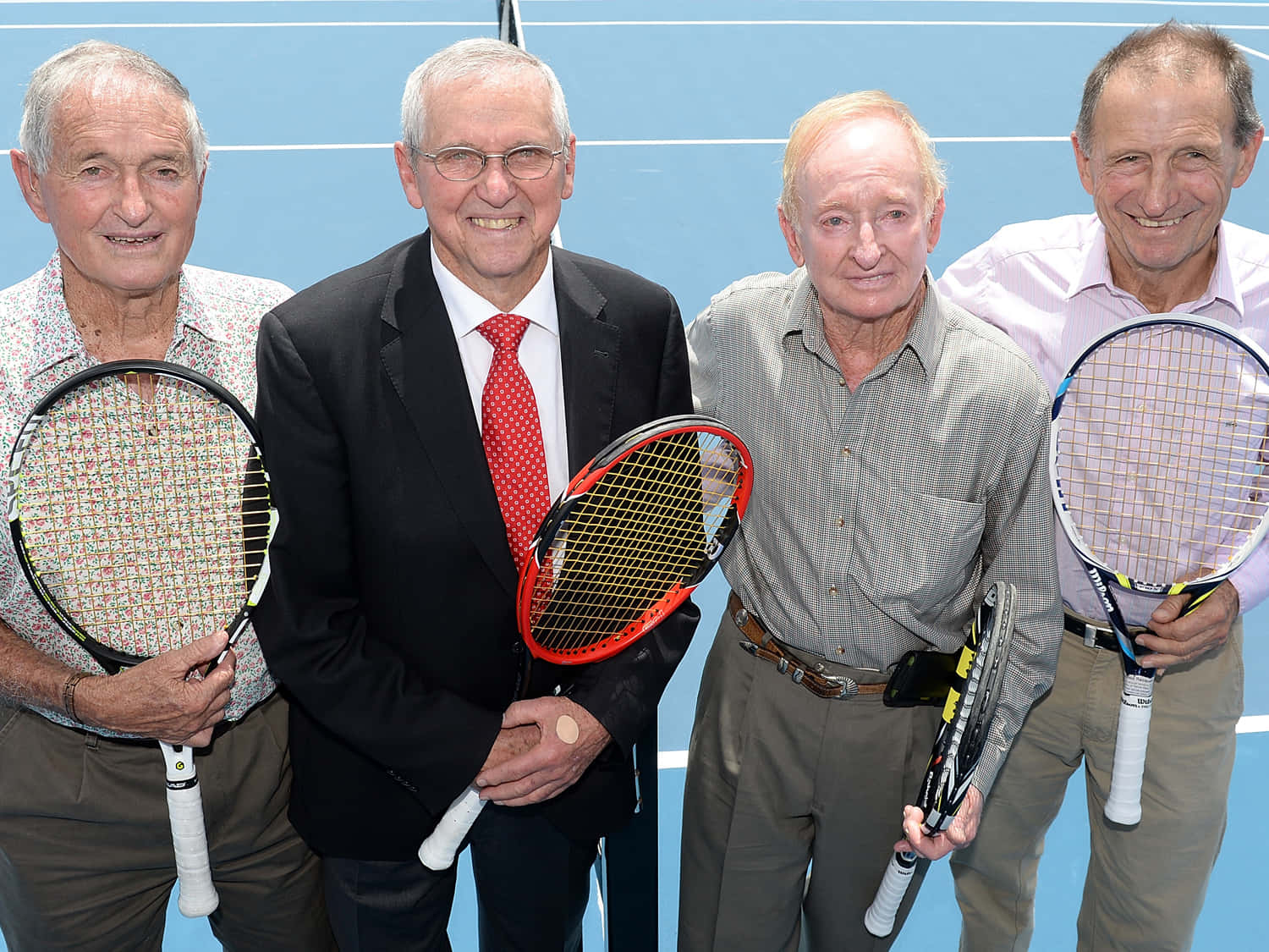 Legendary Athletes Preparing For A Game At The Roy Emerson Tennis Center Wallpaper