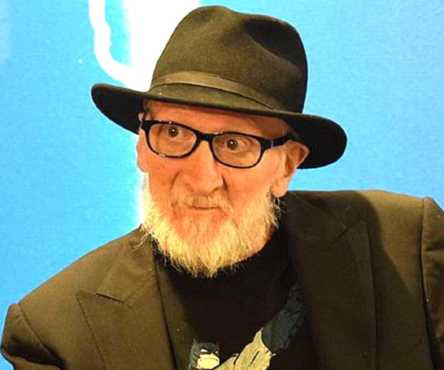 Legendary Comic Book Creator Frank Miller At An Event Wallpaper