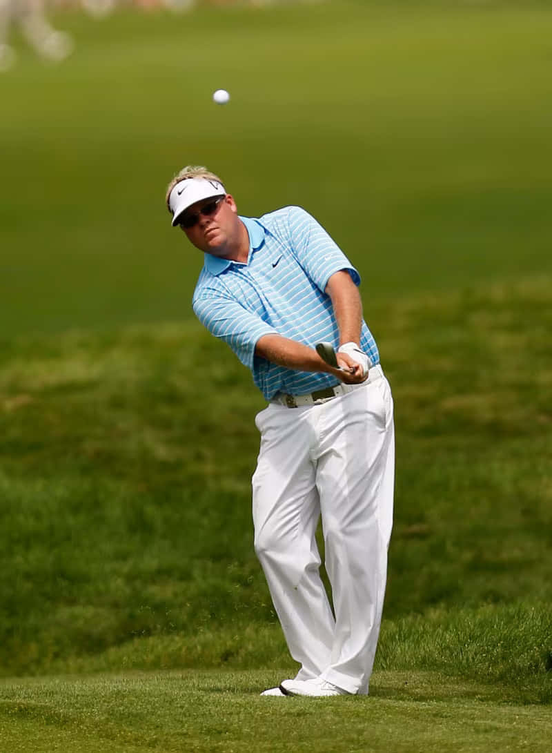 Legendary Golf Player Carl Pettersson Action Shot Wallpaper