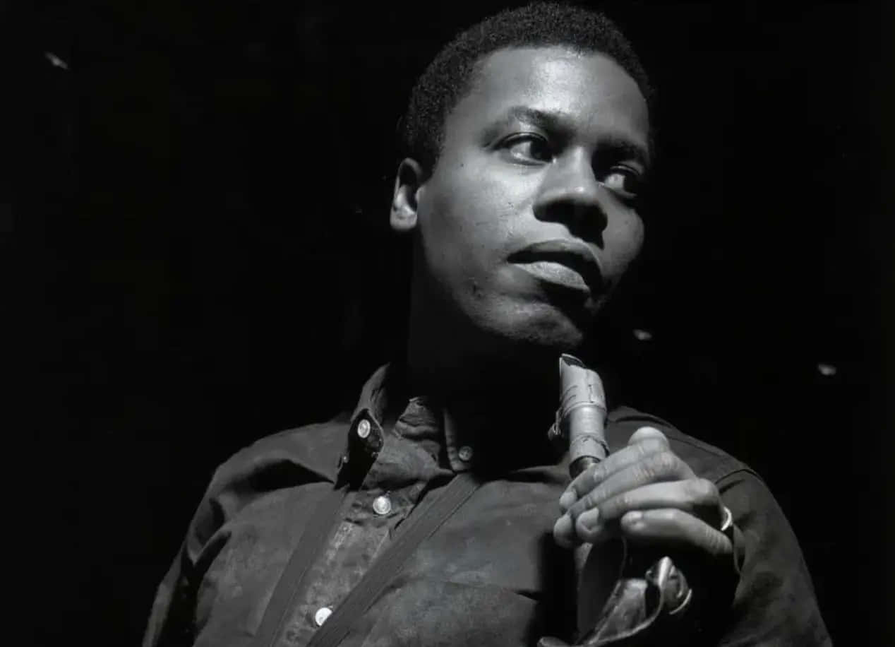 Legendary Jazz Saxophonist Wayne Shorter Performing On Stage Wallpaper