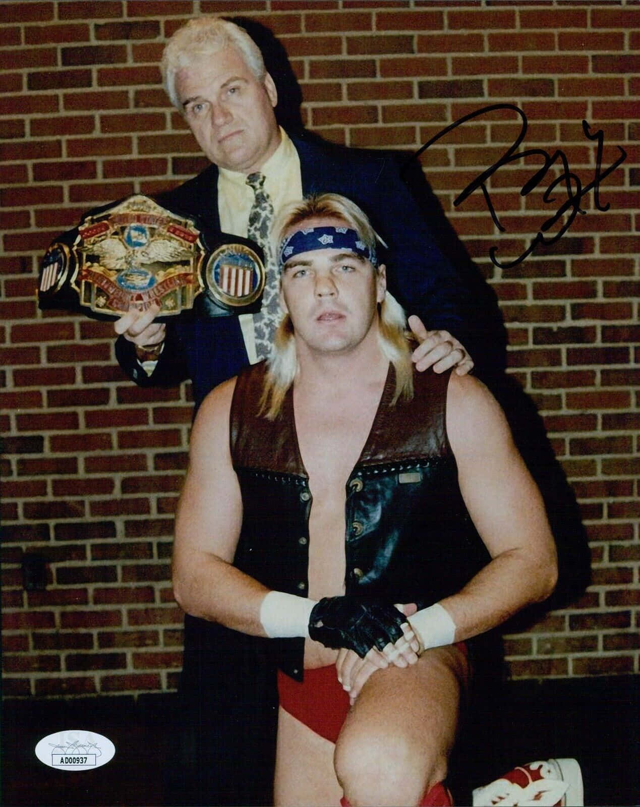 Legendary Pro-wrestler Barry Windham With Manager J.j. Dillon Wallpaper