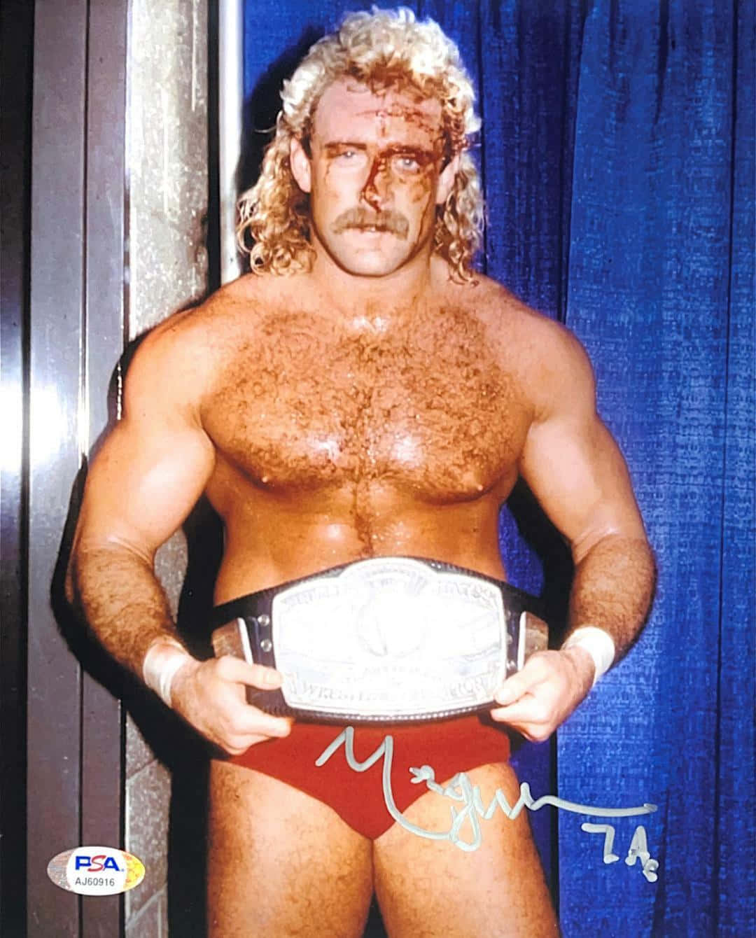 Legendary Pro Wrestler Magnum Ta In Signature Pose Wallpaper