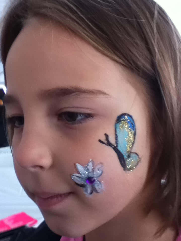 Let Your Imagination Fly With Butterfly Face Painting Wallpaper