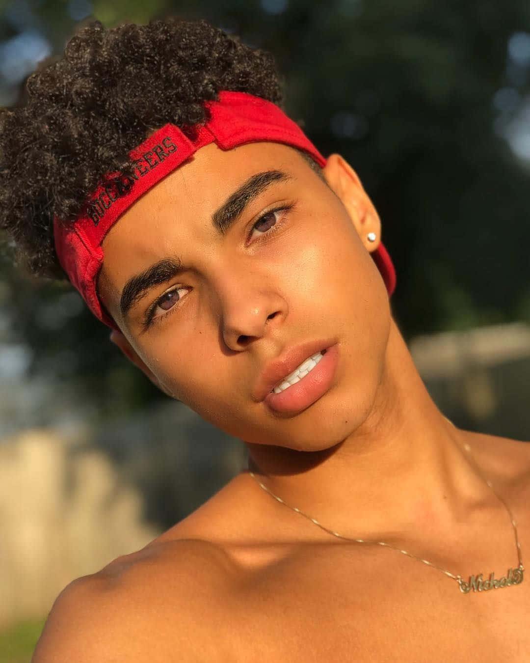 Light Skinned Boy Sunlit Portrait Wallpaper