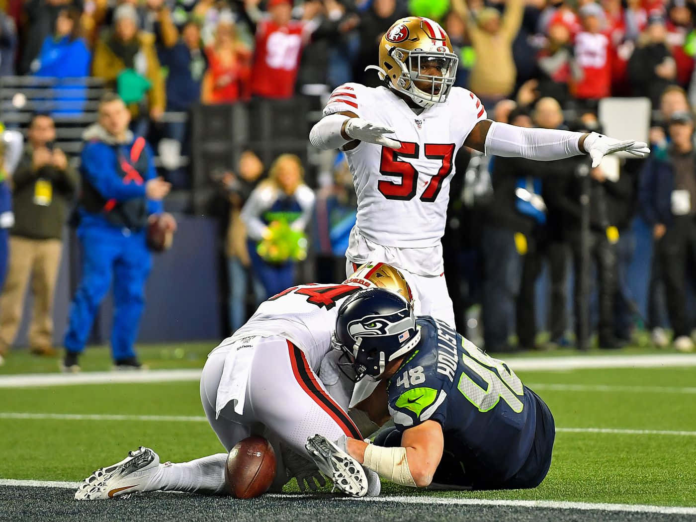 Linebacker Celebrates Tackle During Game Wallpaper