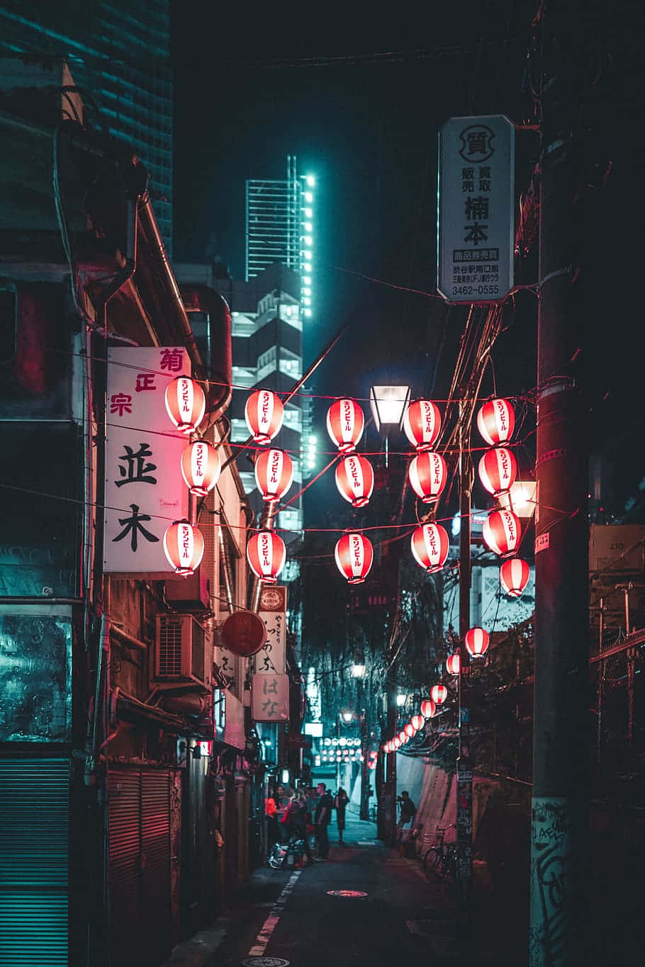 Lively Alleyway In An Urban Center Wallpaper