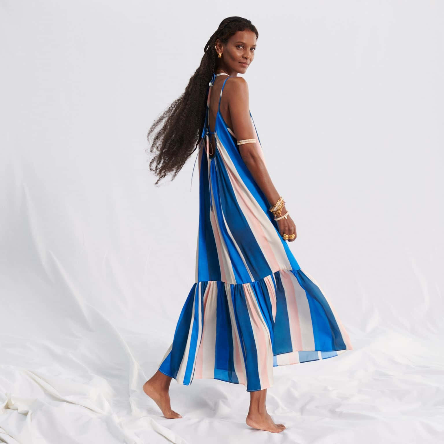 Liya Kebede Striking A Pose In Elegant Attire Wallpaper