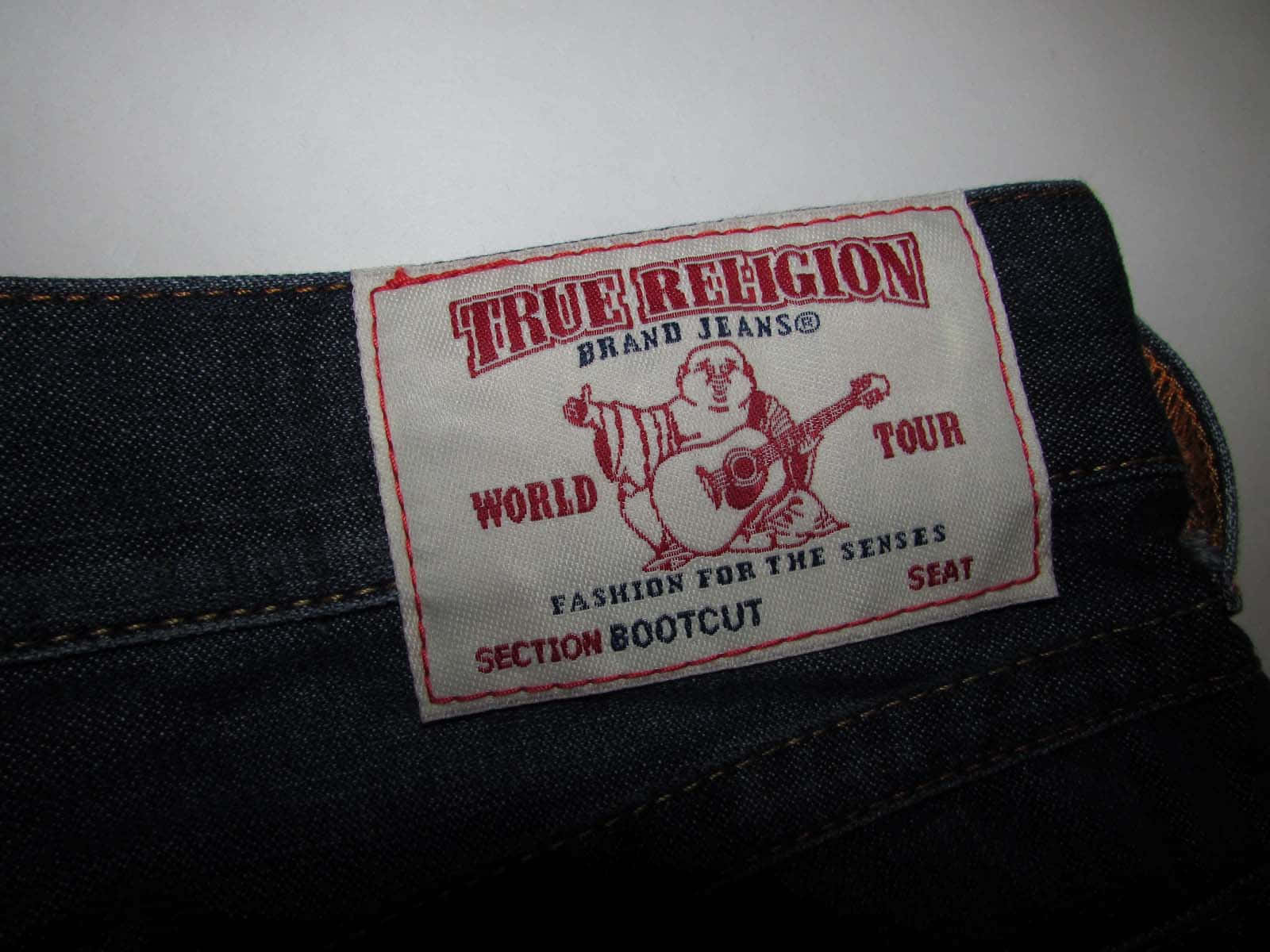 Look Fabulous In True Religion Jeans Wallpaper