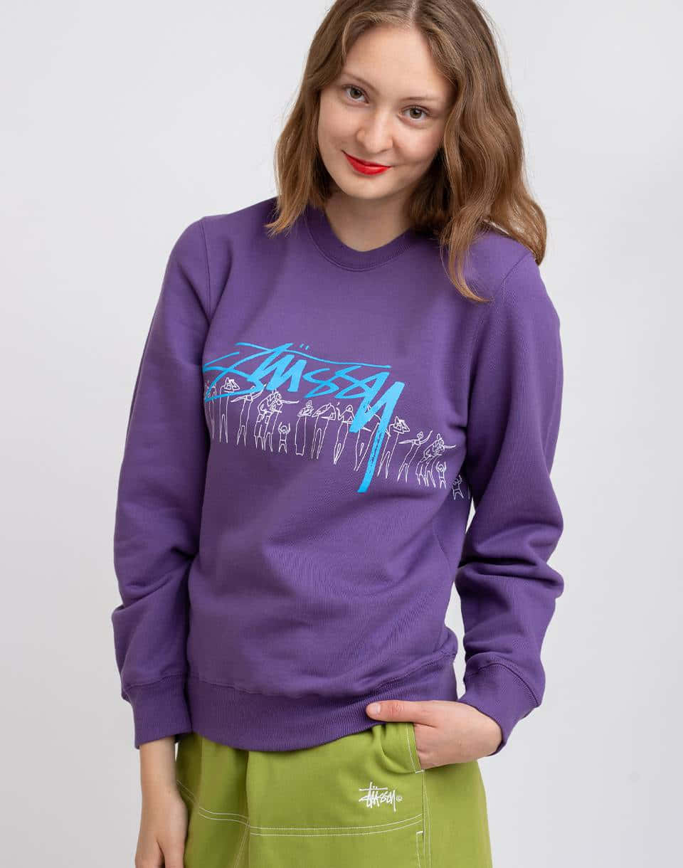 Look Fashionable And Stay Warm This Winter In A Stylish Purple Sweatshirt. Wallpaper