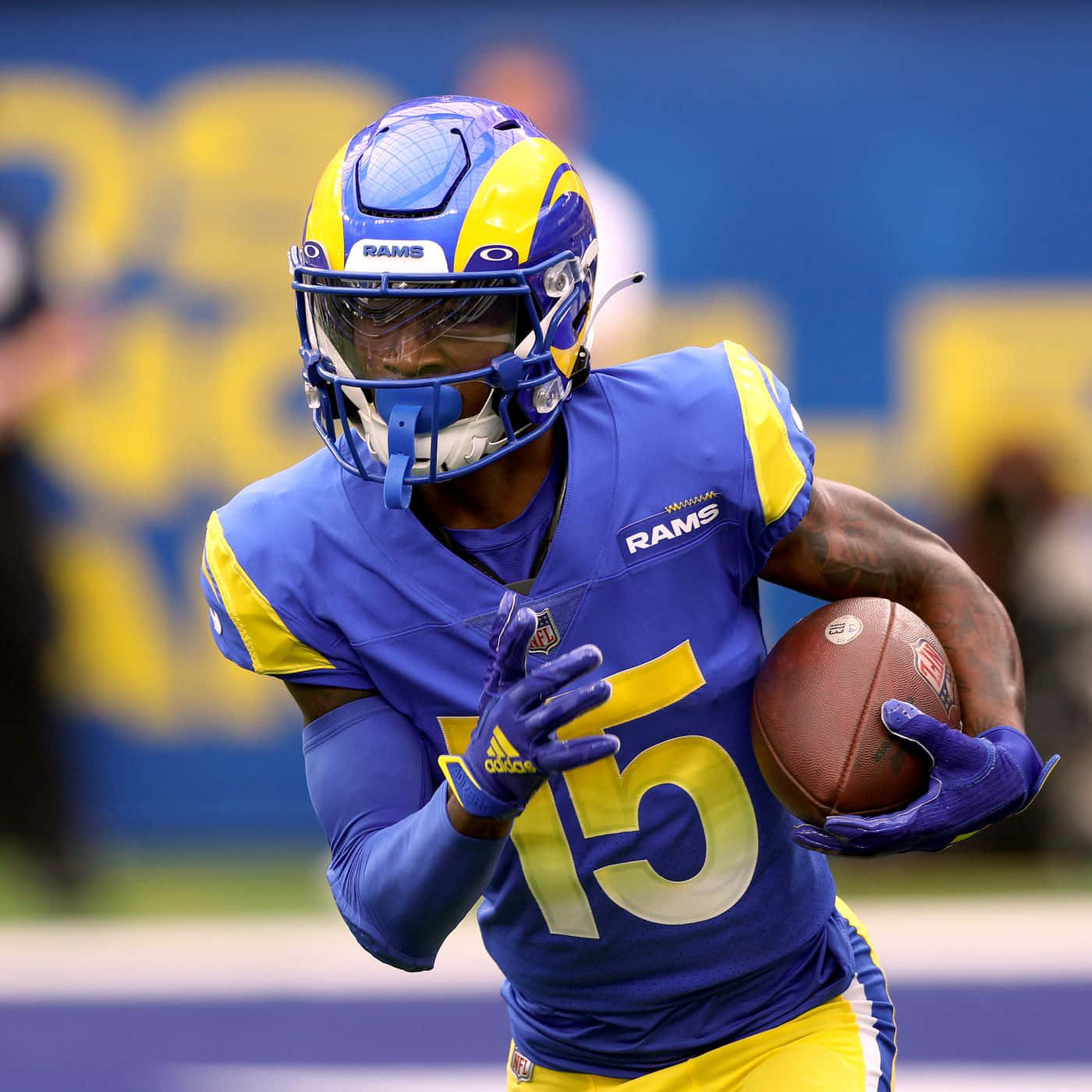 Los Angeles Rams Player Running With Football Wallpaper