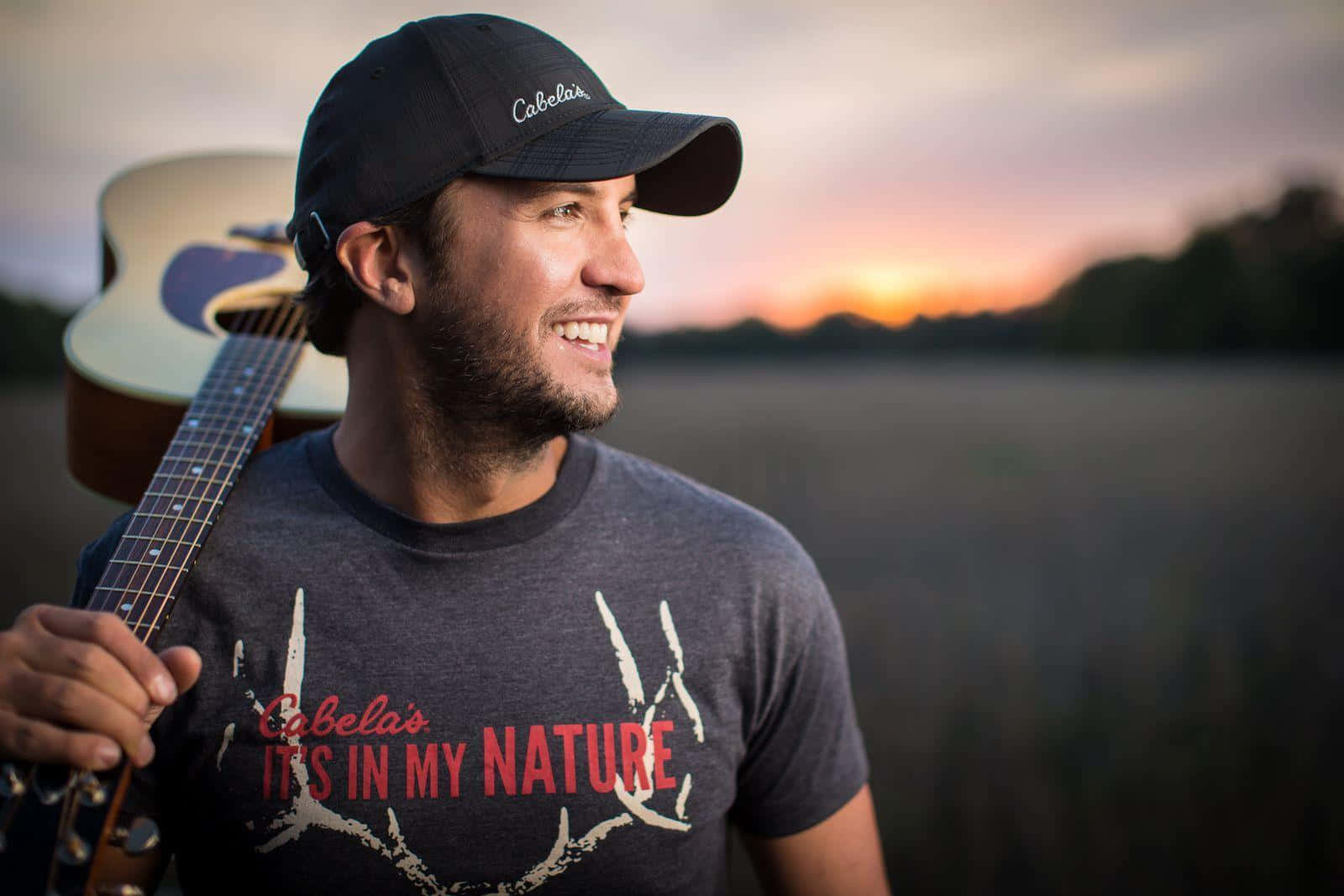 Luke Bryan Belts Out A Song Before Thousands Of Fans Wallpaper