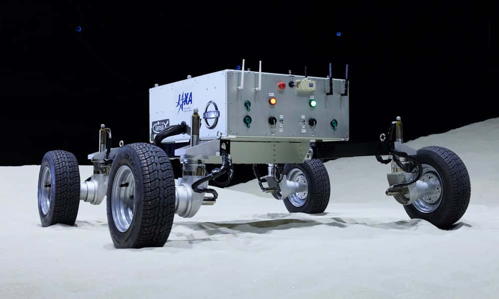 Lunar Rover Exploring The Moon's Surface Wallpaper