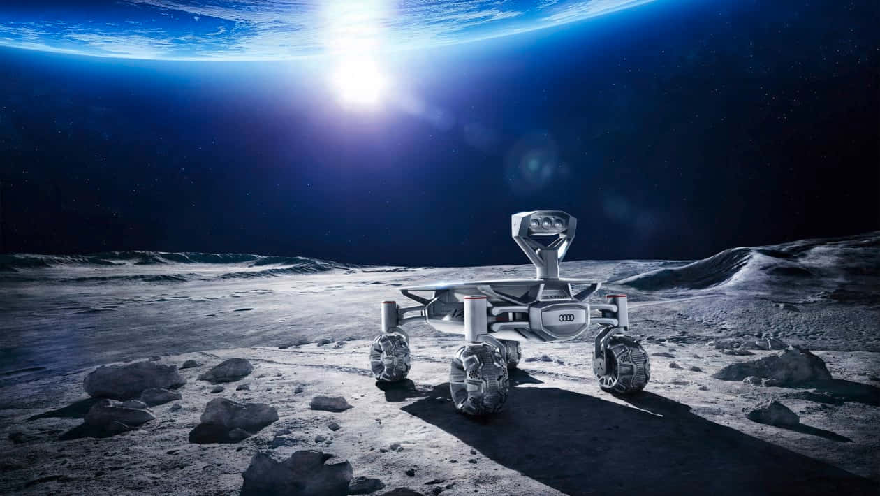 Lunar Rover Exploring The Moon's Surface Wallpaper