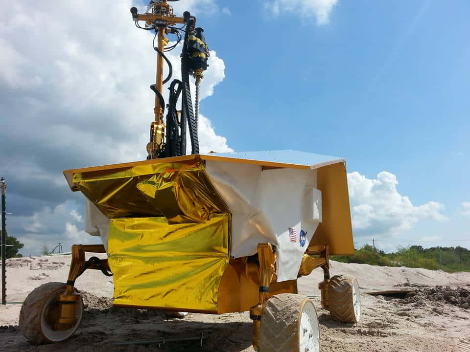 Lunar Rover Exploring The Moon's Surface Wallpaper