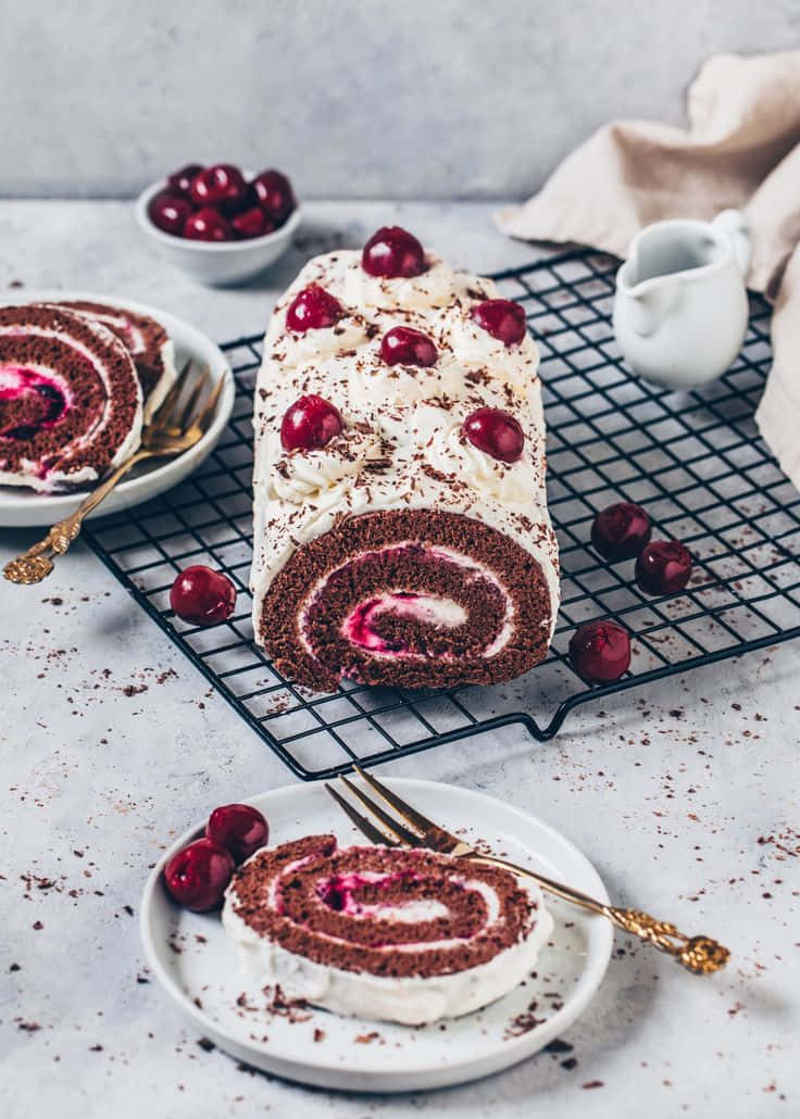 Luscious Layers Of Black Forest Cake Dripping With Sweetness Wallpaper