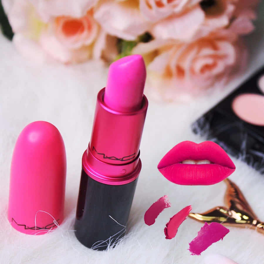 Luscious Pink Lipstick On A Perfect Pout Wallpaper