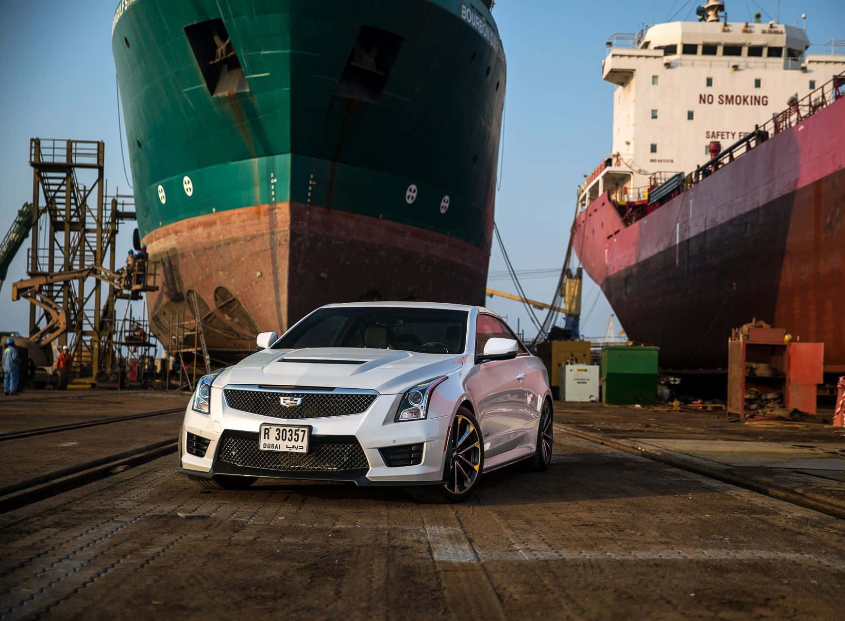 Luxurious Cadillac Ats On Open Road Wallpaper