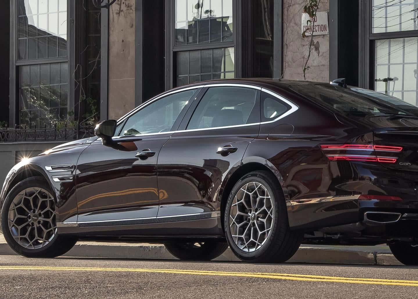 Luxurious Genesis G80 Cruising On The Open Road. Wallpaper