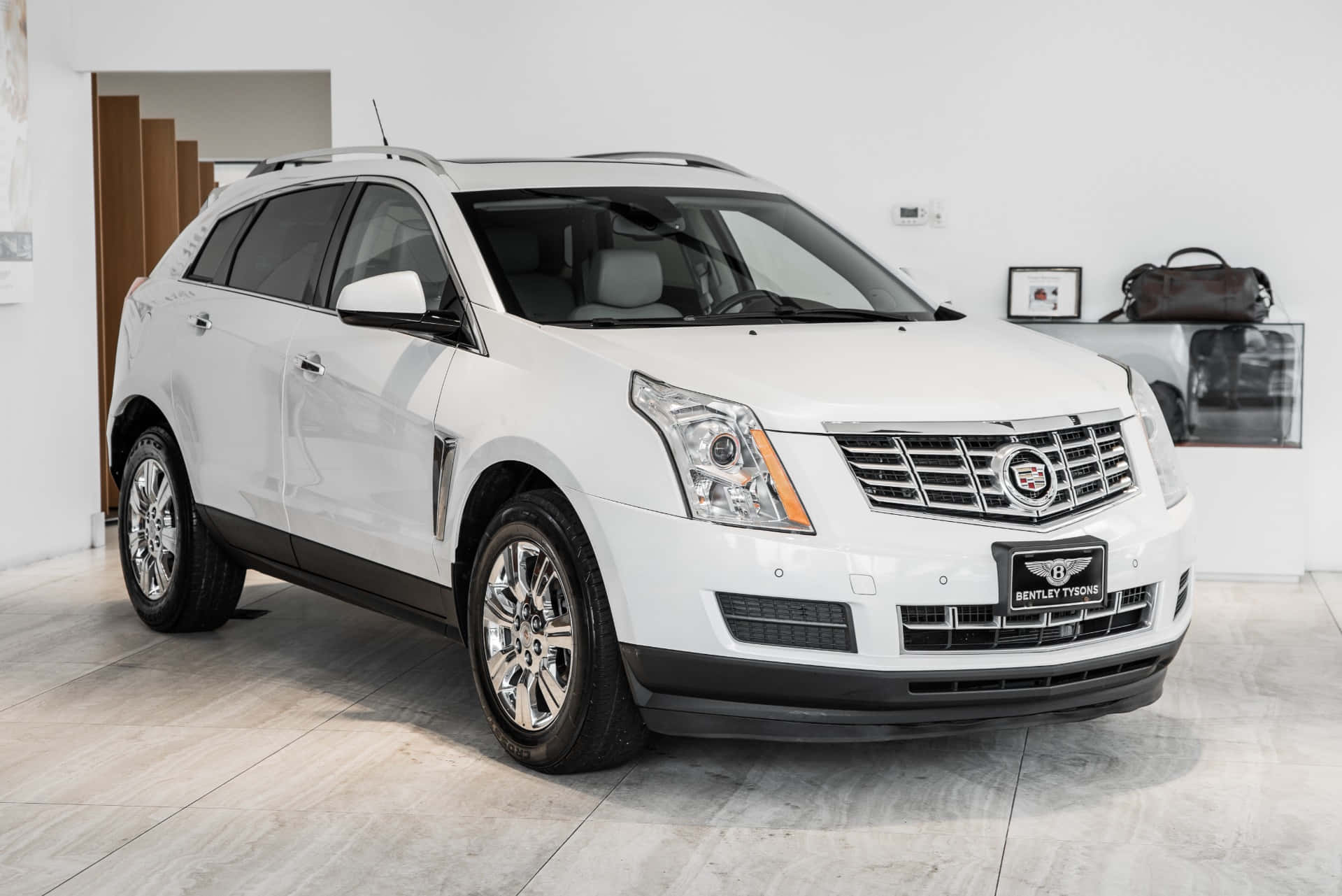 Luxury Meets Performance - The Cadillac Srx Wallpaper