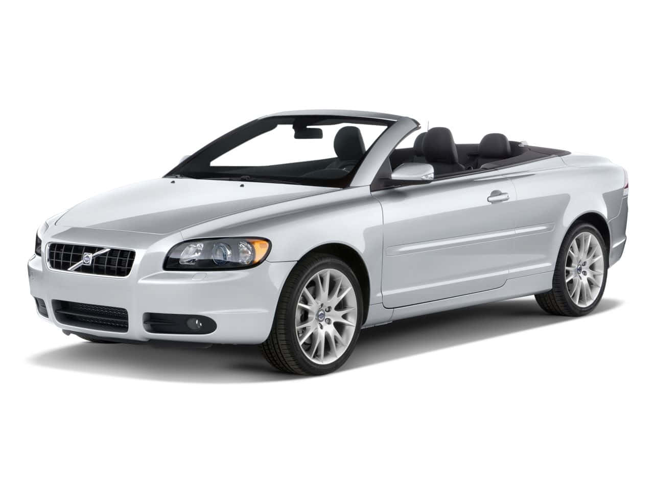 Luxury Volvo C70 Gliding Through The City Streets Wallpaper