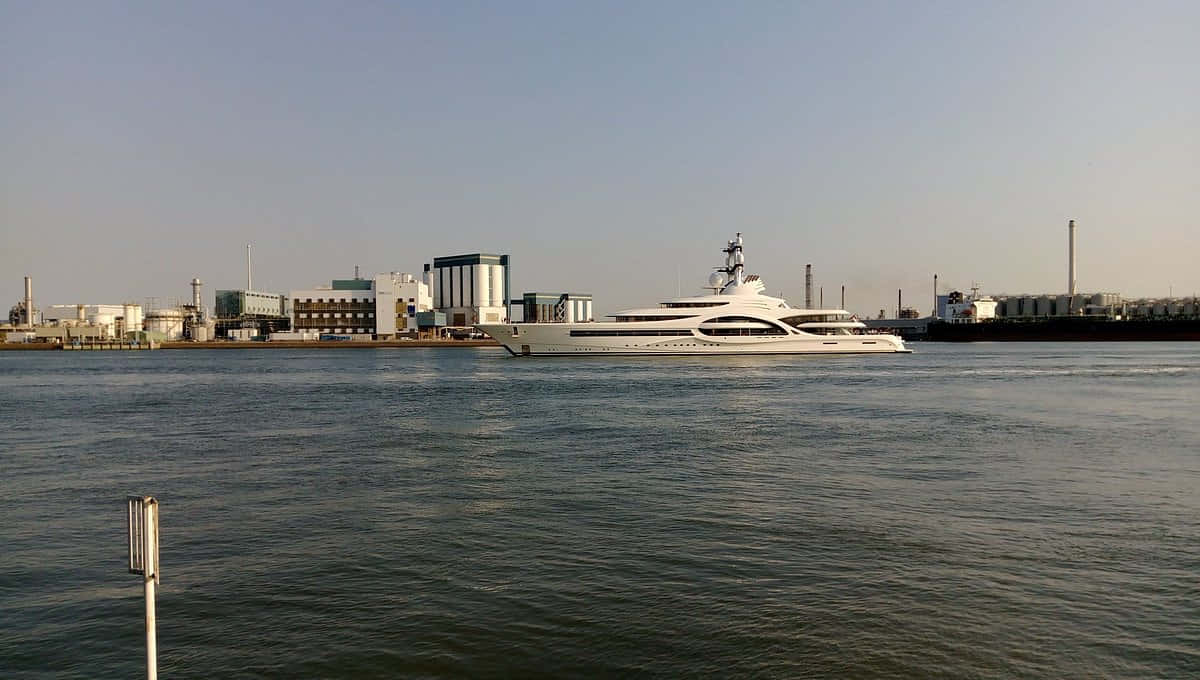 Luxury Yacht Near Industrial Vlaardingen Wallpaper