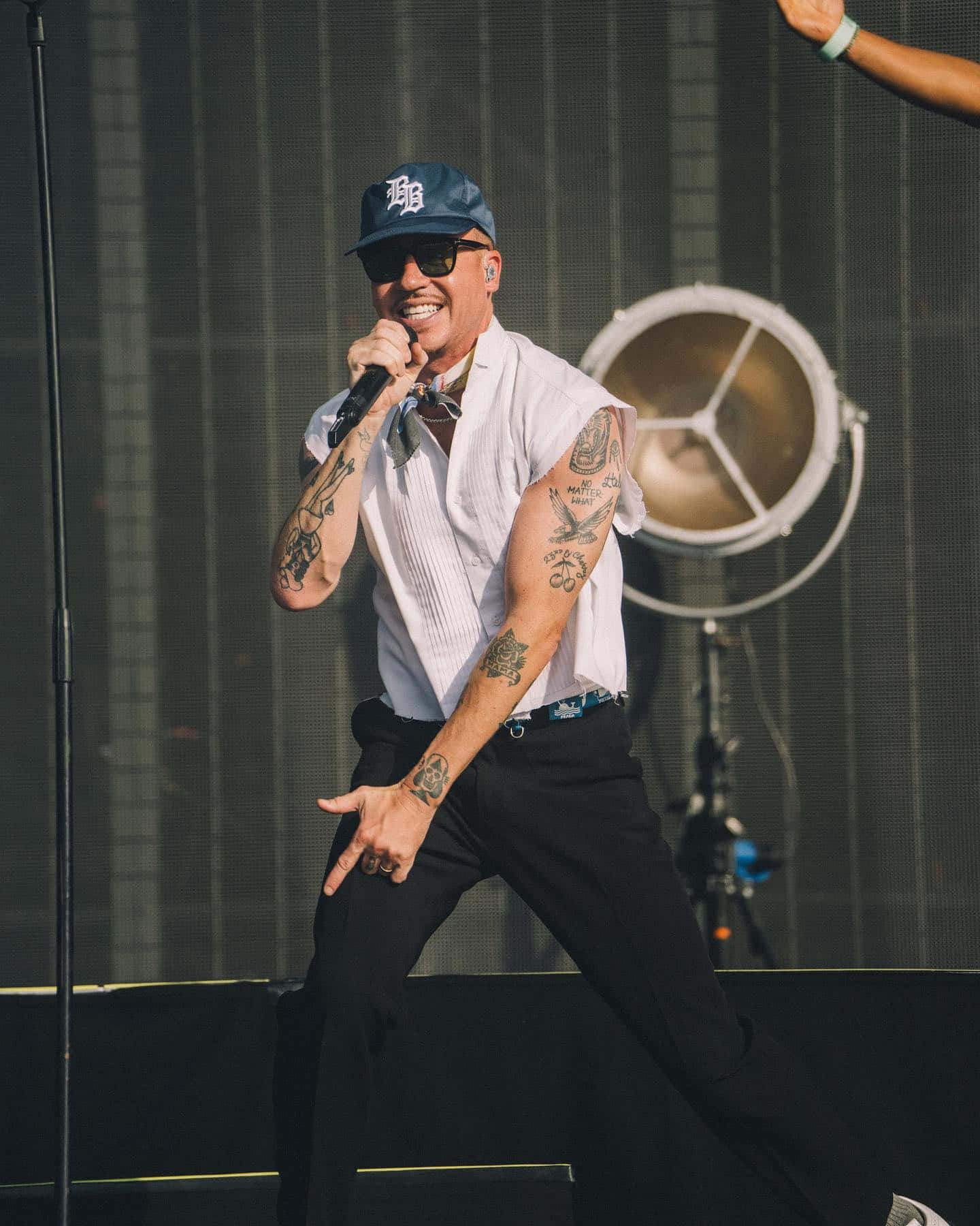 Macklemore Performing Liveon Stage Wallpaper