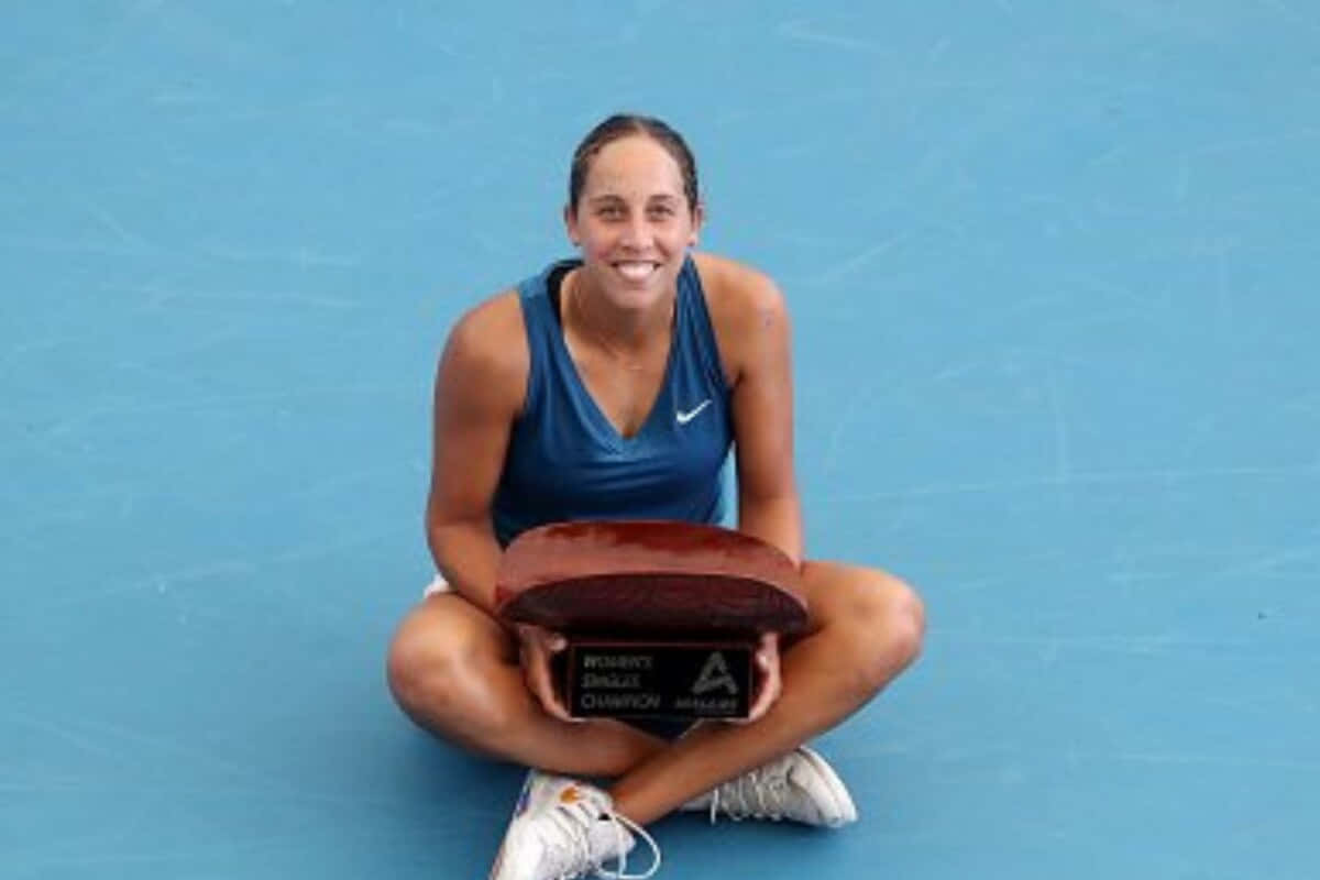 Madison Keys Sitting On Ground Wallpaper