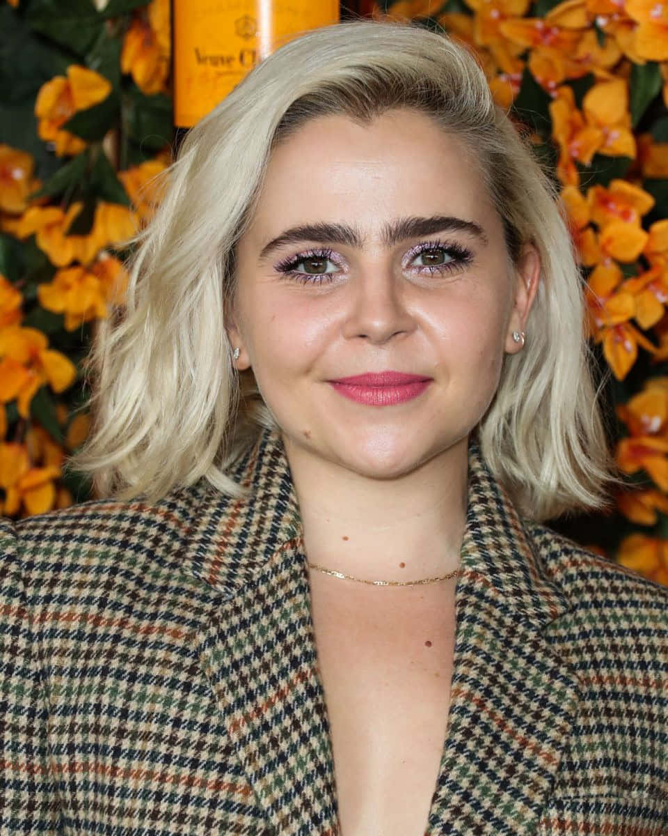 Mae Whitman Striking A Pose On A Rooftop Wallpaper