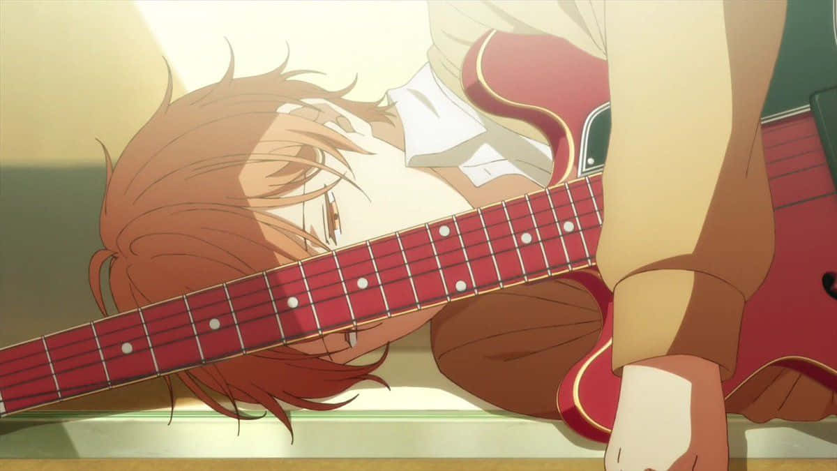 Mafuyu Sato Strumming His Guitar In A Reflective Moment Wallpaper