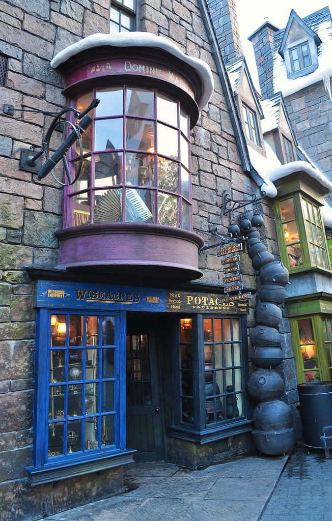 Magical Diagon Alley Bustling With Witches And Wizards Wallpaper