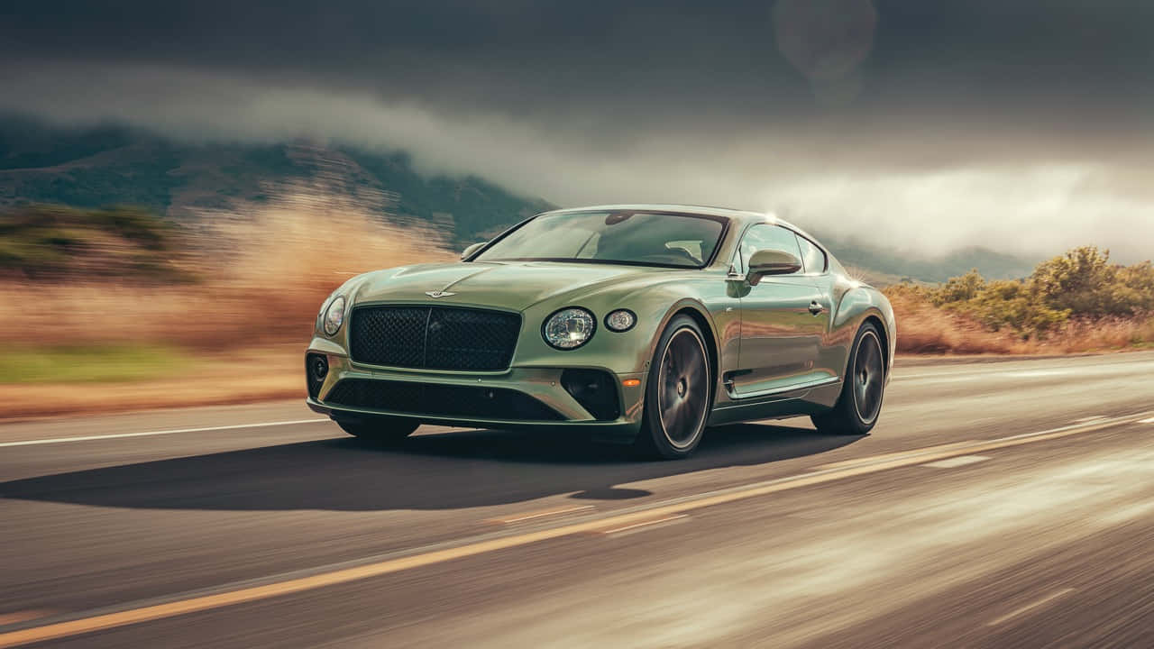 Majestic Bentley Continental Gt On The Move Wallpaper