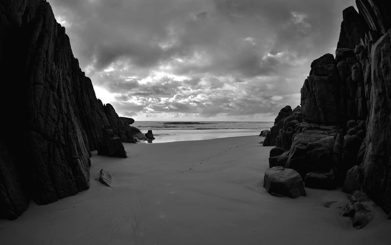 Majestic Dark Rock Formation Wallpaper