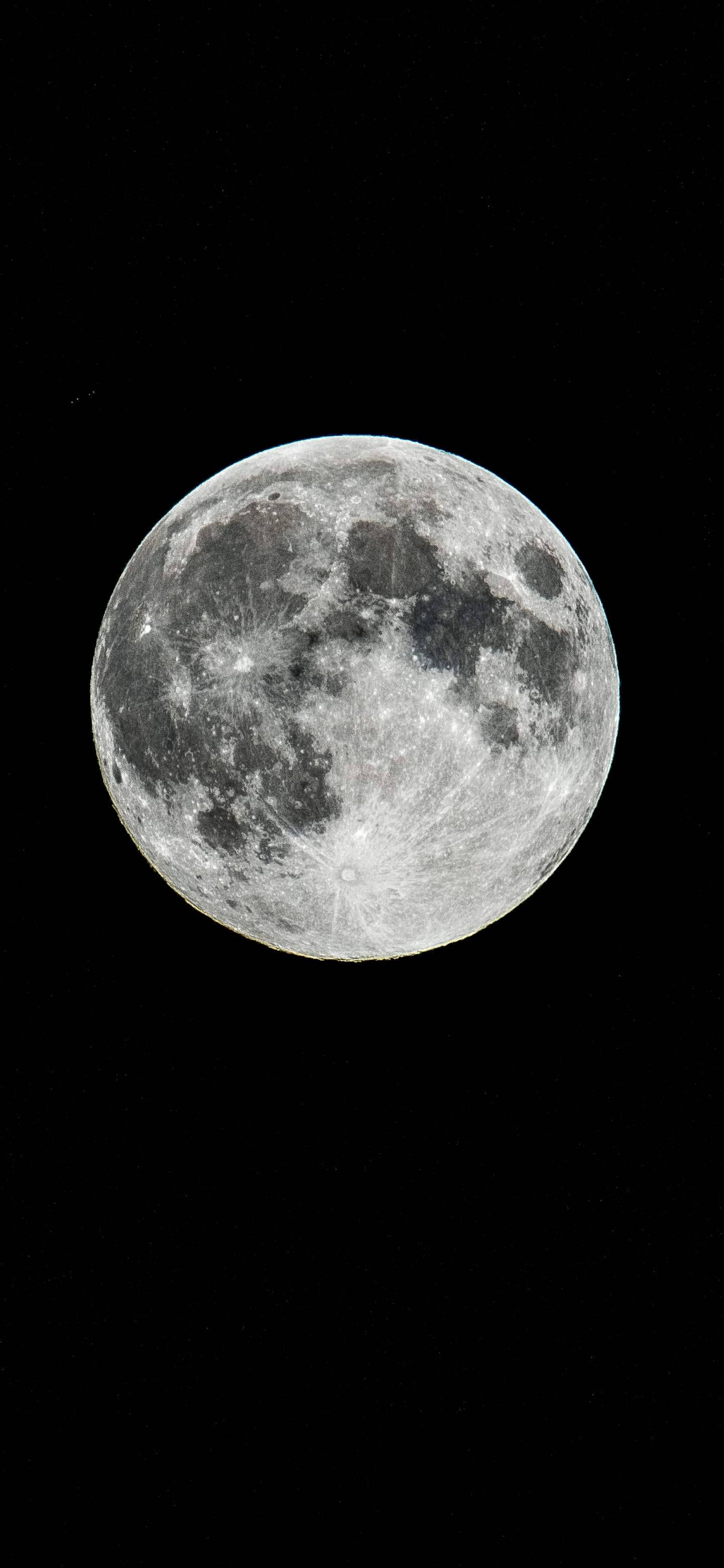 Majestic Display Of Oneplus 7 Pro Against The Backdrop Of The Moon Wallpaper