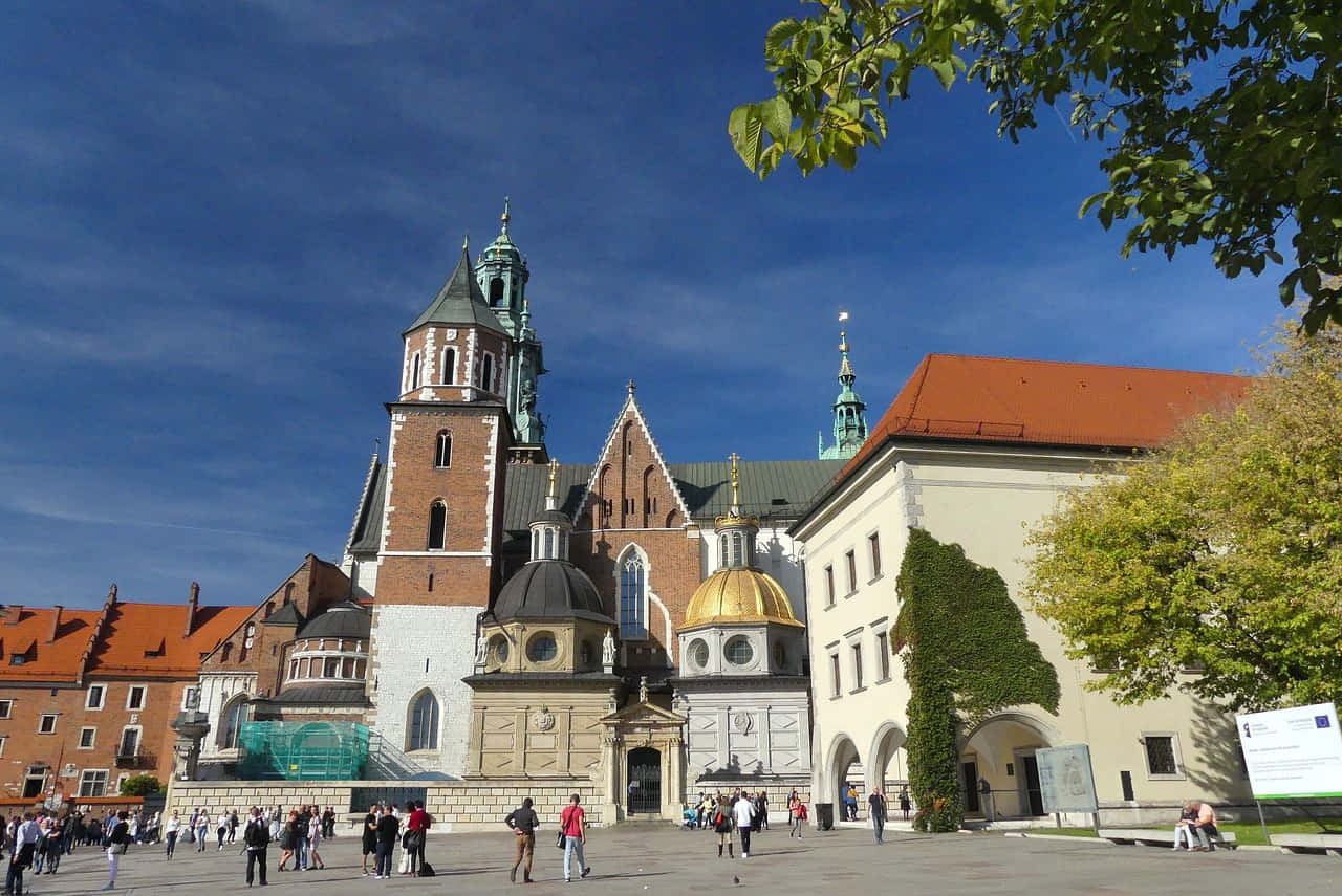 Majestic Facade Of Wawel Castle In Krakow, Poland Wallpaper