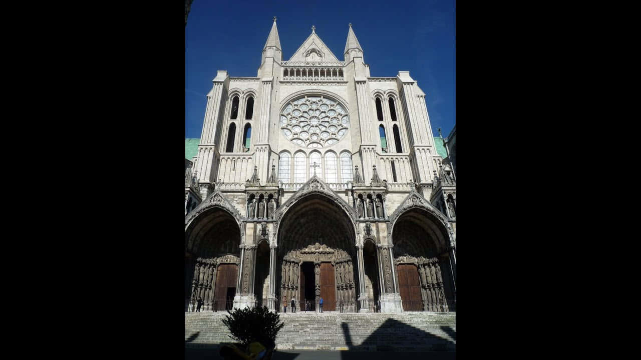 Majestic Gothic Architecture In The Evening Light Wallpaper