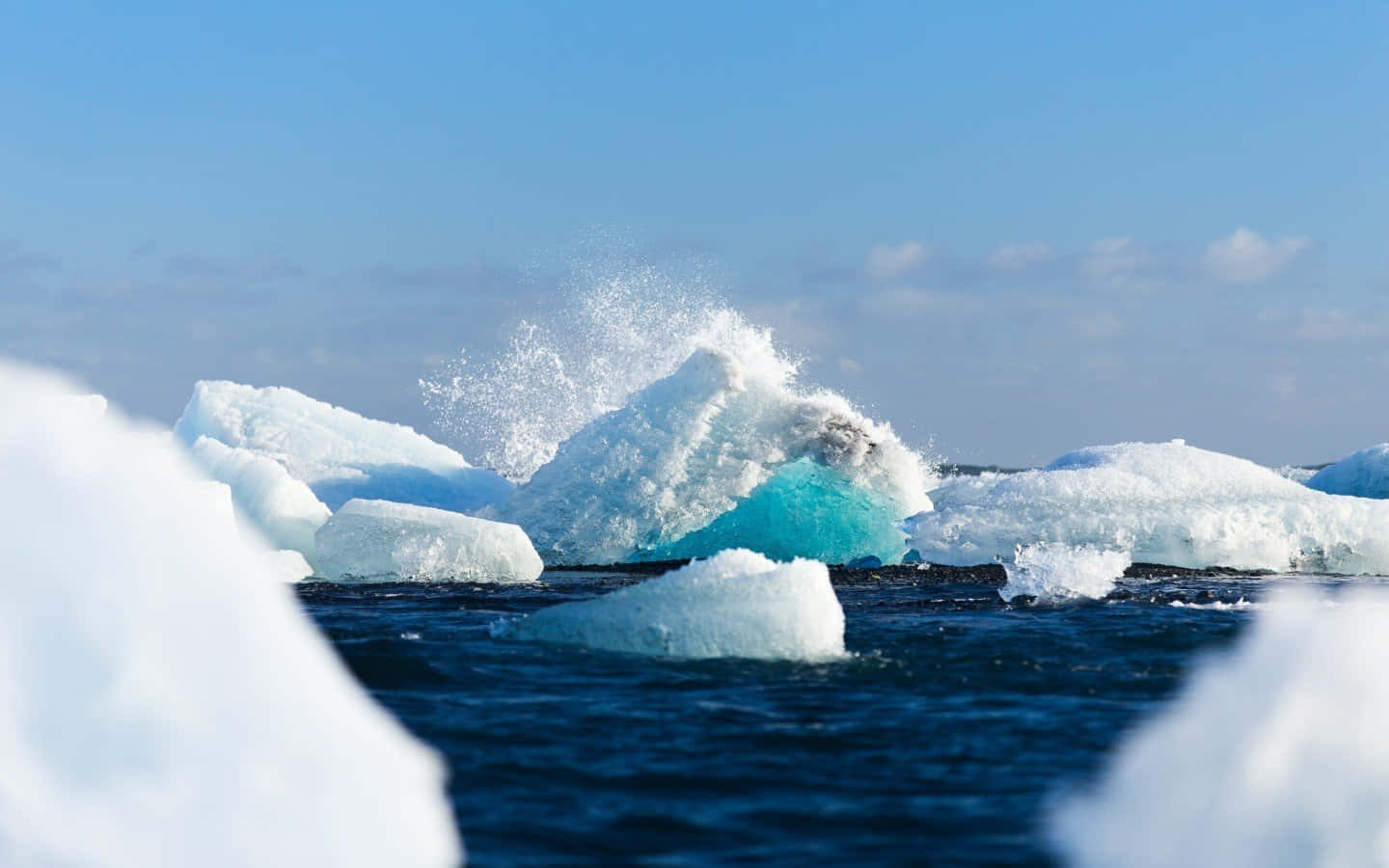 Majestic Iceberg In Pristine Waters Wallpaper